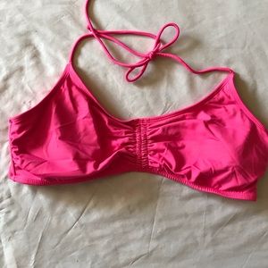 Bright pink bikini swimsuit top